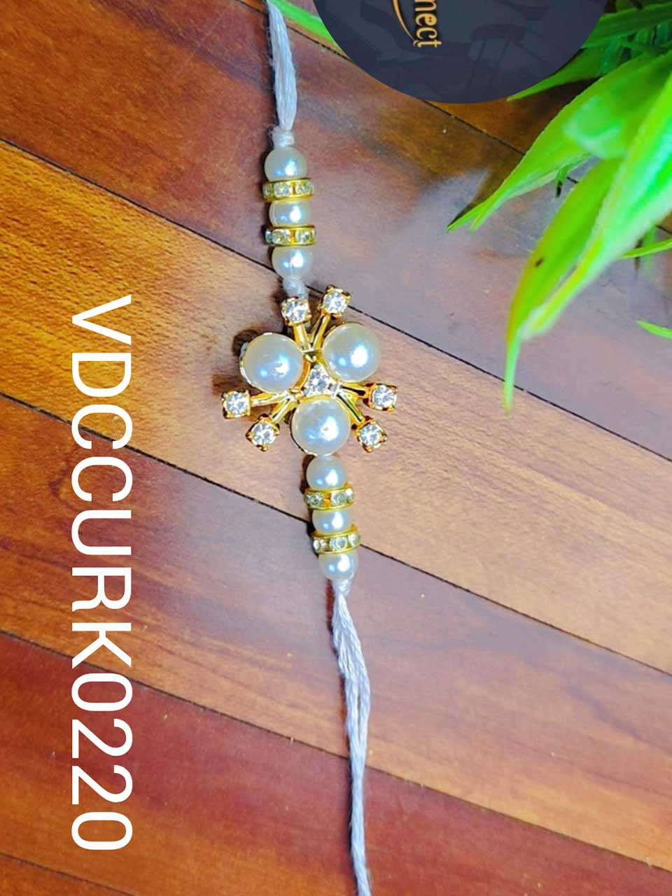 Beautiful pearls with stones Rakhi -Handcrafted